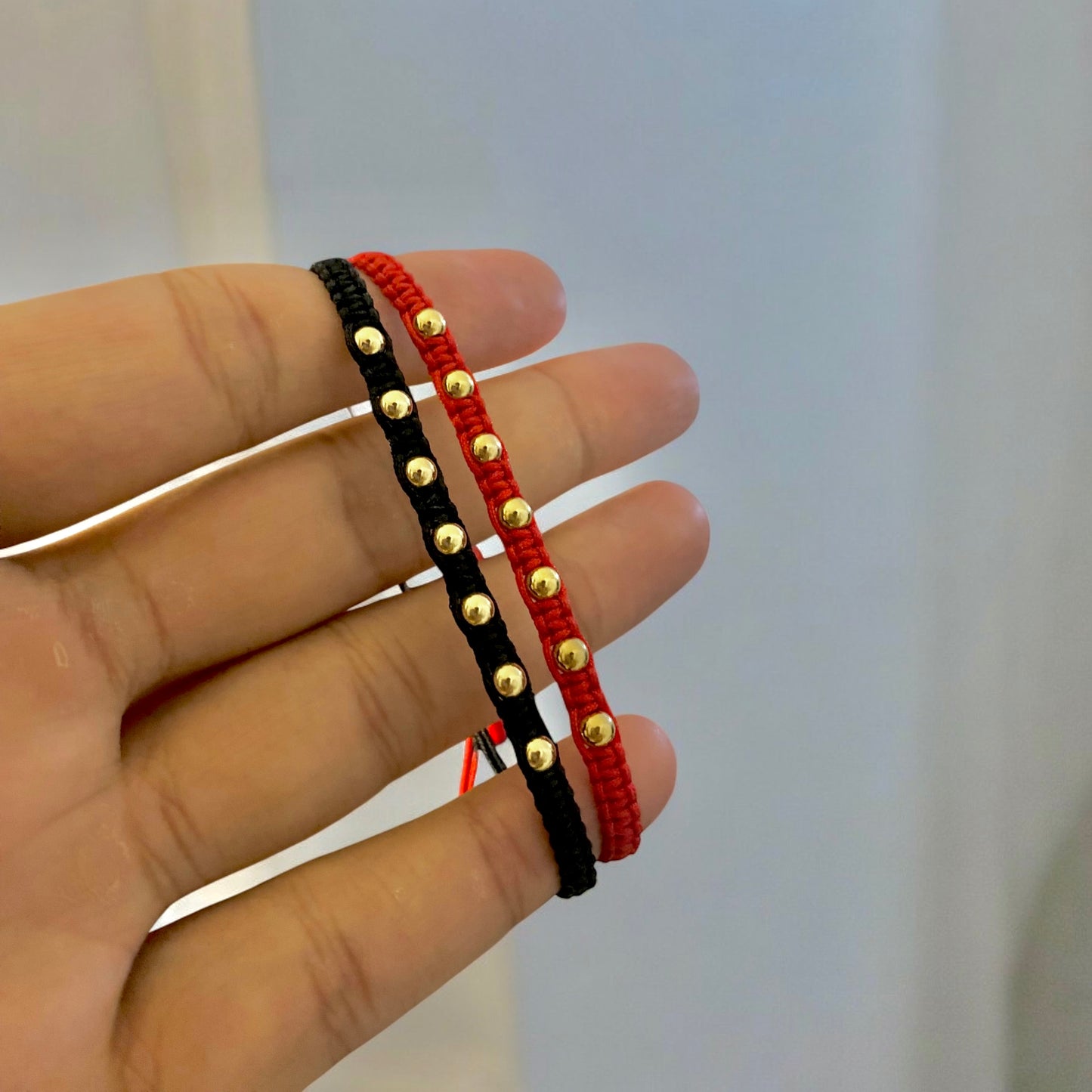 PAR DE MANILLAS ENTRELAZADOS